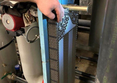 Replacement of swimming pool heater plate stack